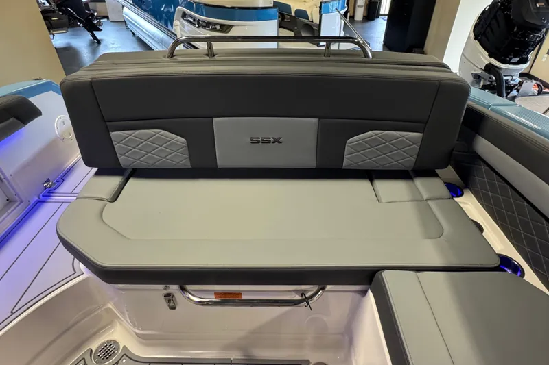 Slide: The Image of 2026 Chaparral 267 SSX boat interior with sleek, modern seating and stylish design. - 14