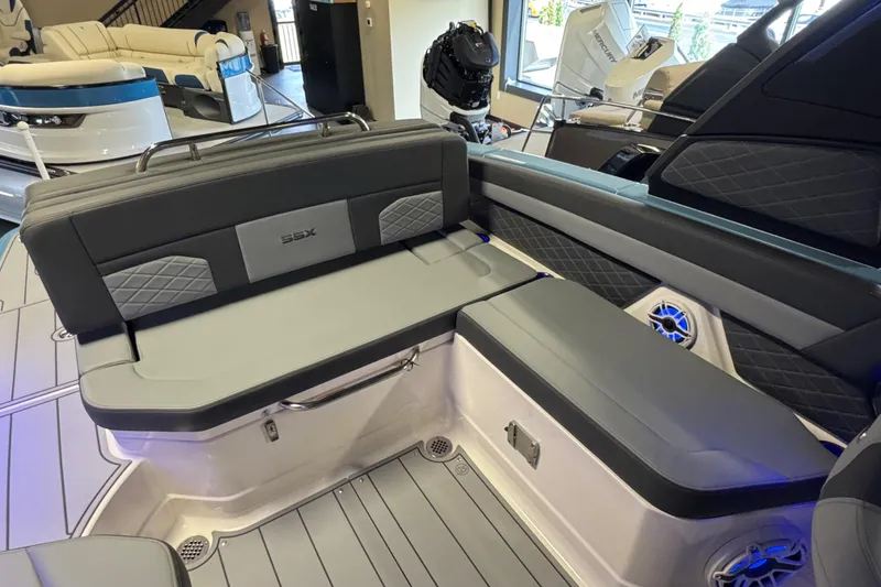 Slide: The Image of 2026 Chaparral 267 SSX boat interior with luxurious seating and modern design. - 15