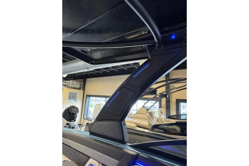 Slide: The Image of 2026 Chaparral 267 SSX boat interior with modern design and sleek features. - 5