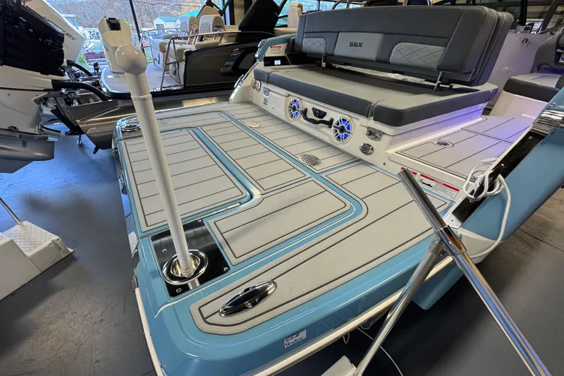 Slide: The Image of 2026 Chaparral 267 SSX boat with spacious deck and modern seating. - 6