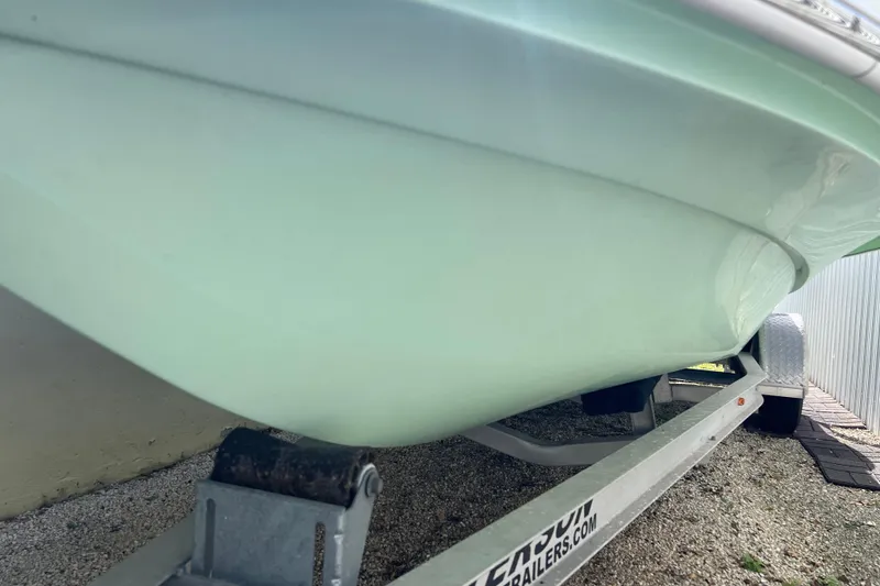 Slide: The Image of 2017 Beavertail Skiffs Mosquito 18 on trailer, close-up view of hull. - 17