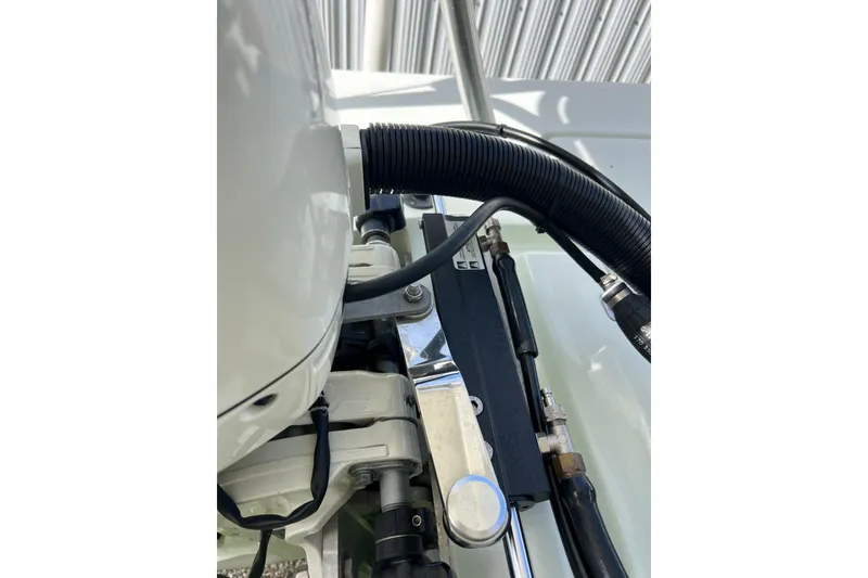 Slide: The Image of Close-up of 2017 Beavertail Skiffs Mosquito 18 engine components and wiring. - 31