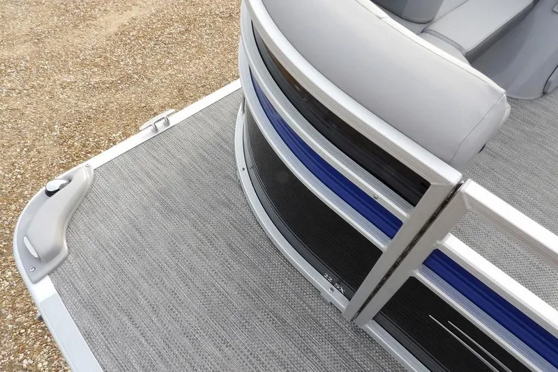 Slide: The Image of 2024 Bennington 22 SXS pontoon boat, featuring sleek design and comfortable seating. - 16