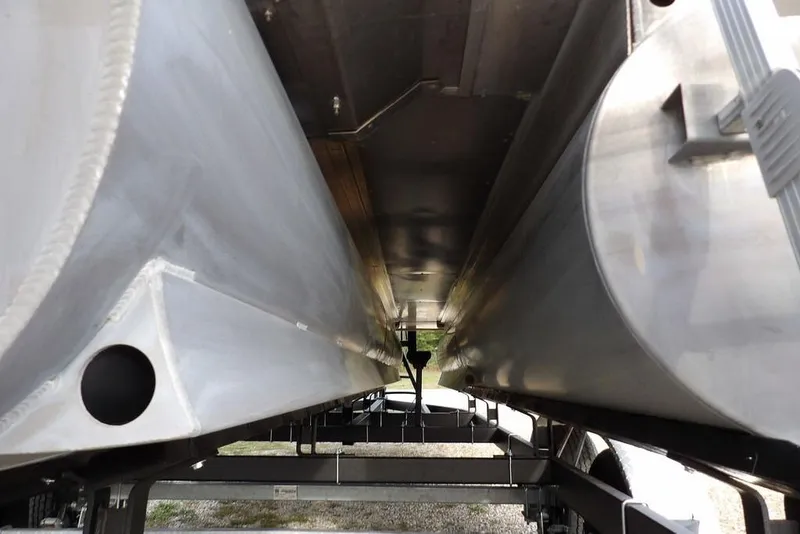 Slide: The Image of Underneath view of 2024 Bennington 22 SXS pontoon boat, showcasing aluminum pontoons. - 38