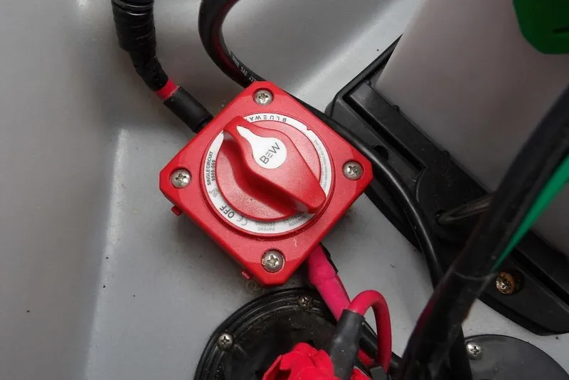 Slide: The Image of Red battery switch in a 2024 Bennington 22 SXS boat. - 4