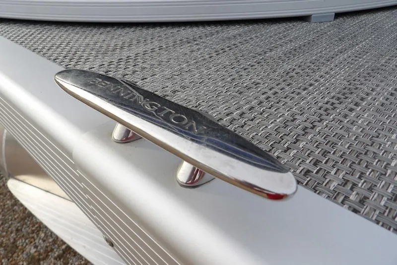Slide: The Image of Close-up of 2024 Bennington 22 SXS boat cleat on woven deck surface. - 7