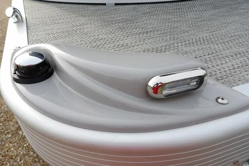 Slide: The Image of 2024 Bennington 22 SXS boat detail with sleek design and modern lighting. - 8