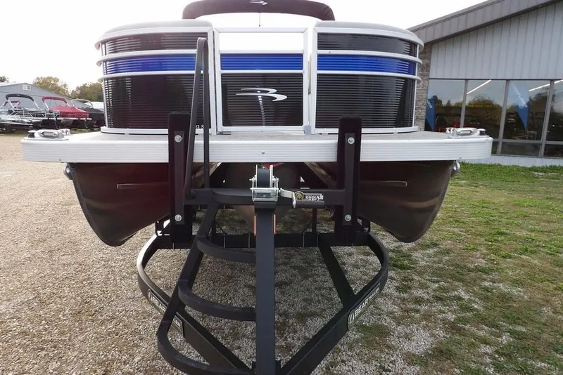 Slide: The Image of 2024 Bennington 22 SXS pontoon boat on trailer, front view. - 9