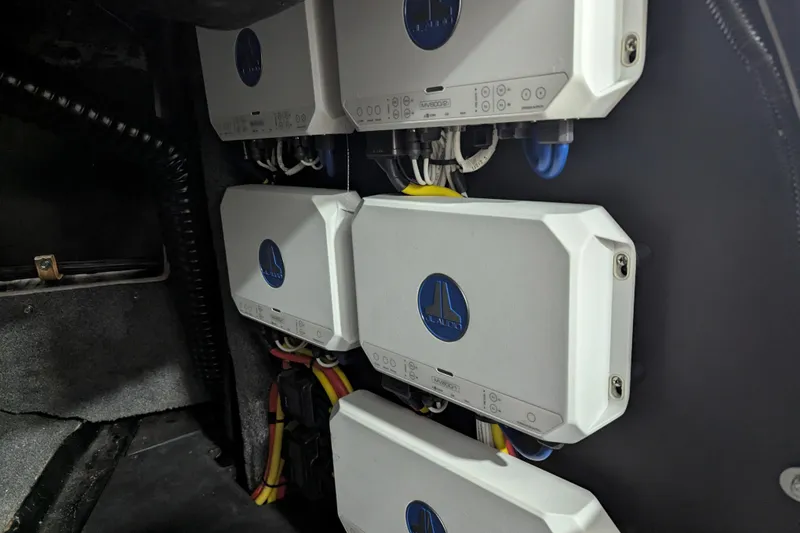 Slide: The Image of Audio system components in a 2022 Malibu Wakesetter 22 LSV boat. - 24