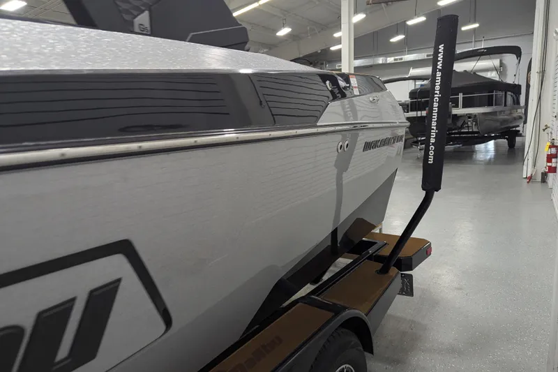 Slide: The Image of 2022 Malibu Wakesetter 22 LSV boat in showroom, side view on trailer. - 9