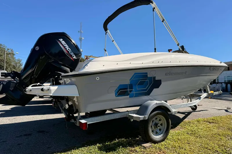 The Image of 2021 Bayliner Element E16 boat on trailer with Mercury outboard motor. - 0