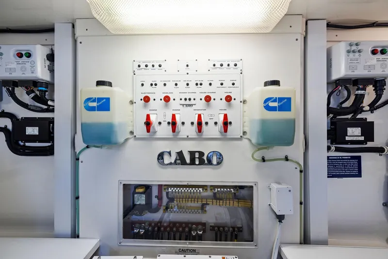 Slide: The Image of Control panel of a 2012 Cabo 44 Hardtop Express yacht. - 47