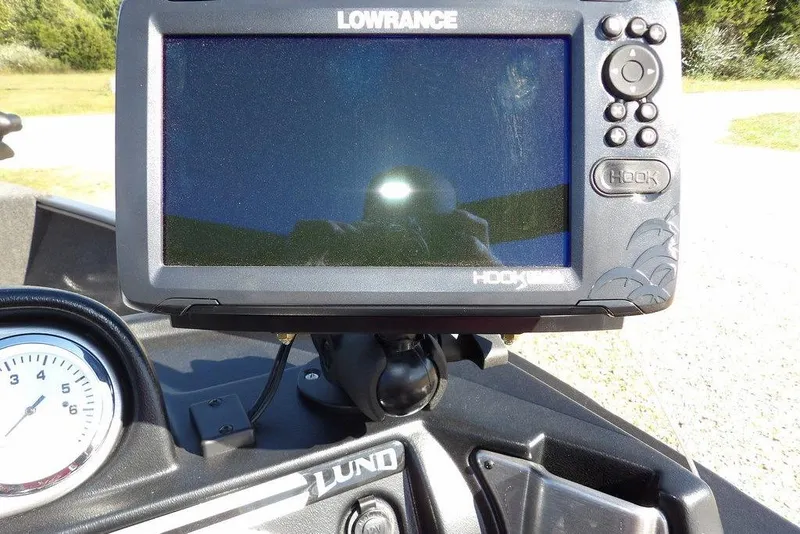 Slide: The Image of Lowrance Hook fish finder on 2023 Lund 1675 Adventure SS boat dashboard. - 27