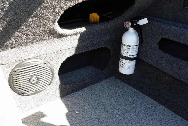 Slide: The Image of 2023 Lund 1675 Adventure SS interior with fire extinguisher and speaker. - 29