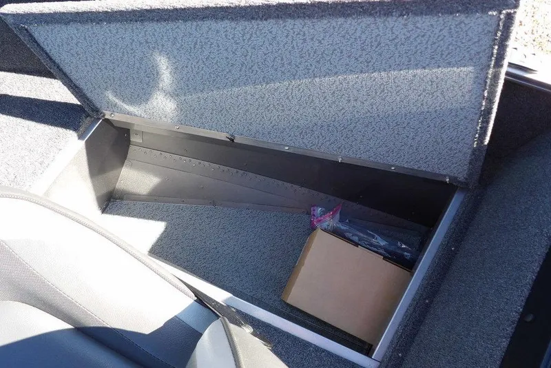 Slide: The Image of Open storage compartment in 2023 Lund 1675 Adventure SS boat. - 36