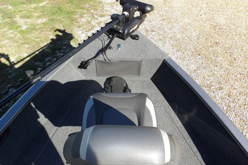 Slide: The Image of 2023 Lund 1675 Adventure SS boat interior with seating and equipment. - 37