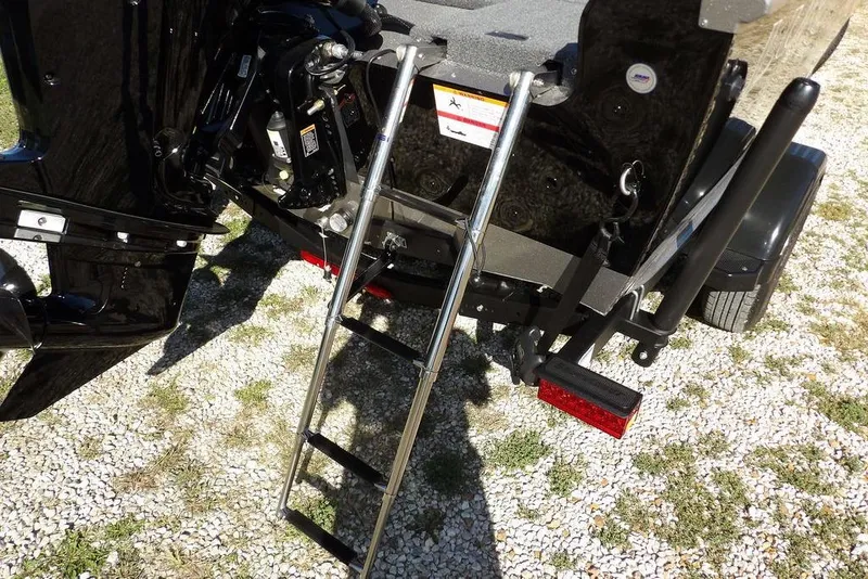 Slide: The Image of 2023 Lund 1675 Adventure SS boat with ladder and motor detail. - 50