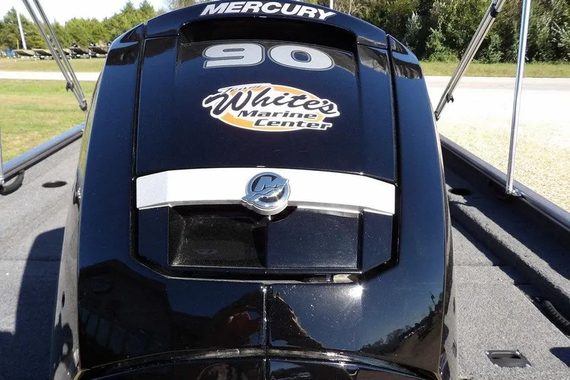 Slide: The Image of 2023 Lund 1675 Adventure SS with Mercury 90 engine, featuring White's Marine Center logo. - 55