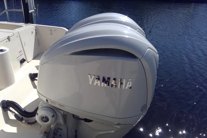 Slide: The Image of 2023 Grady-White Freedom 285 with Yamaha outboard engine on water. - 13