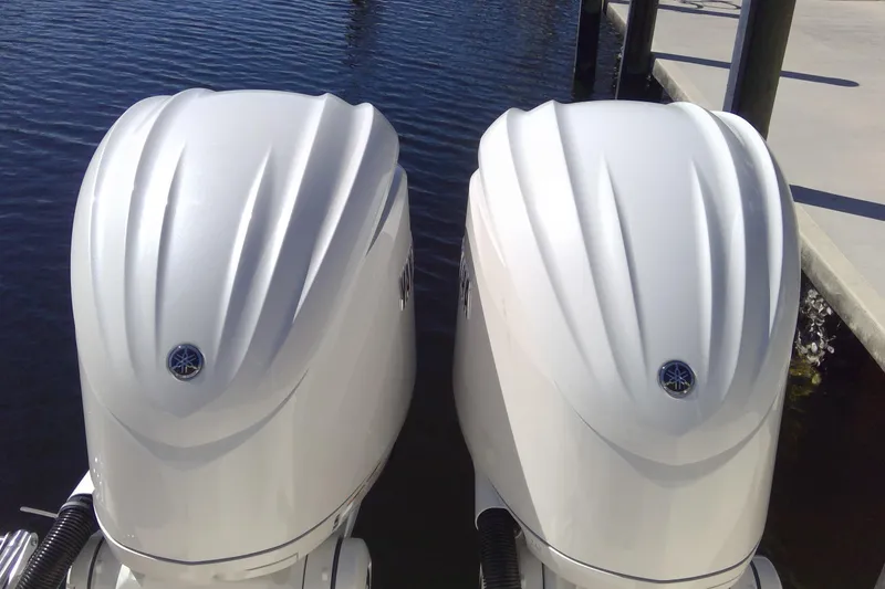 Slide: The Image of Twin Yamaha outboard engines on a 2023 Grady-White Freedom 285 boat. - 16