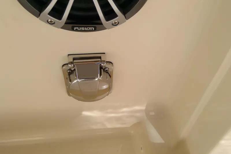 Slide: The Image of 2023 Grady-White Freedom 285 boat speaker and chrome fixture detail. - 18
