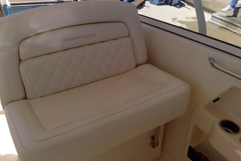 Slide: The Image of 2023 Grady-White Freedom 285 boat interior seat with quilted design. - 23
