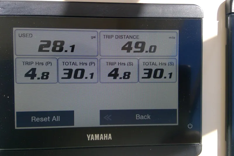 Slide: The Image of Yamaha display showing fuel usage and trip data for 2023 Grady-White Freedom 285. - 24