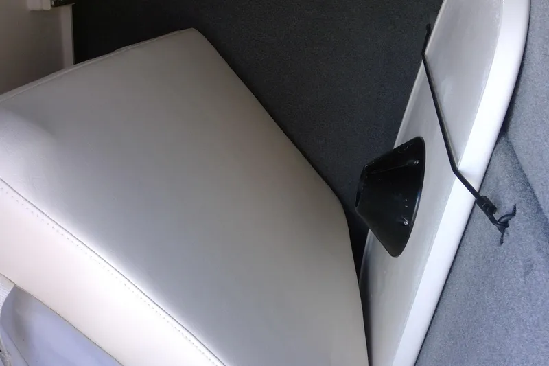 Slide: The Image of 2023 Grady-White Freedom 285 interior seat detail with black strap. - 33