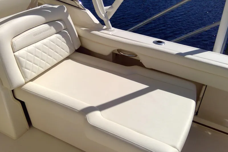 Slide: The Image of 2023 Grady-White Freedom 285 boat seat with white upholstery and ocean view. - 36