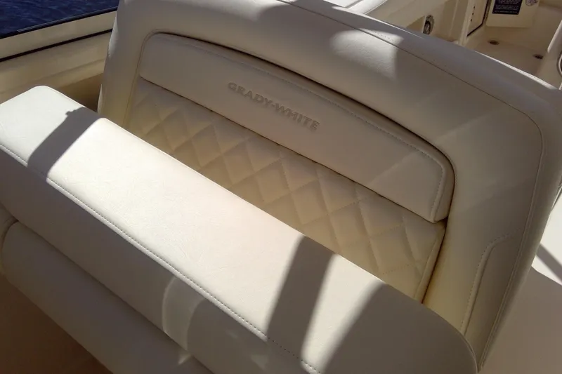 Slide: The Image of 2023 Grady-White Freedom 285 boat seat with quilted design and logo. - 40