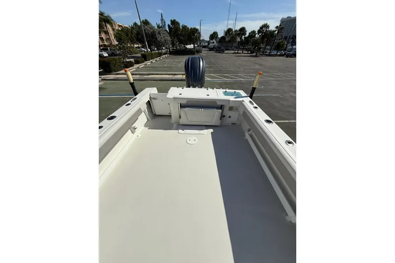 Slide: The Image of 2023 Parker 2320 Sport Cabin boat interior, featuring spacious deck and modern design. - 38