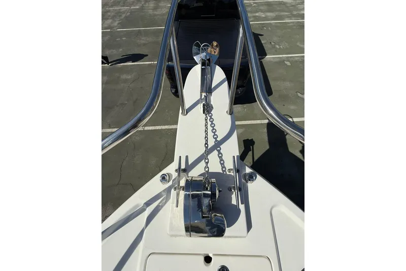 Slide: The Image of 2023 Parker 2320 Sport Cabin boat anchor and chain on deck. - 40