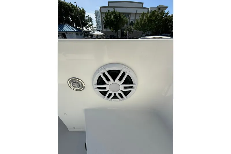 Slide: The Image of Speaker and light fixture on 2023 Parker 2320 Sport Cabin boat interior. - 47