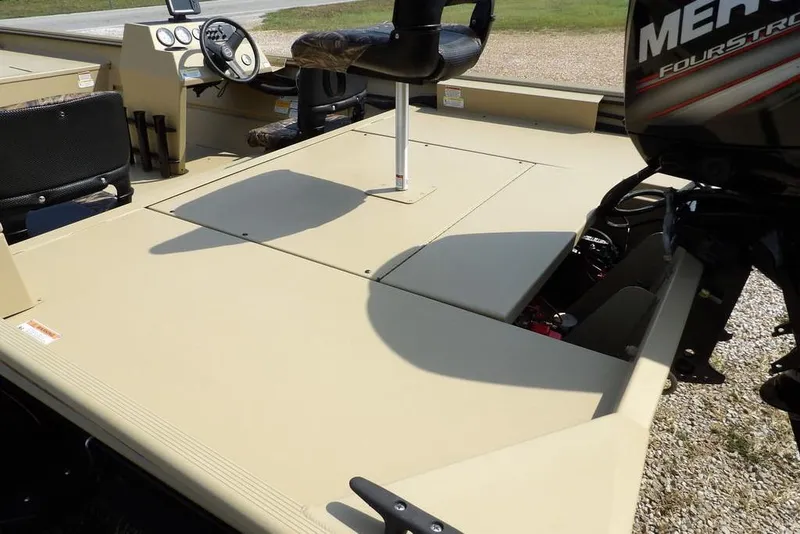 Slide: The Image of 2023 Crestliner 2070 Retriever SC boat interior with steering console and seating. - 12