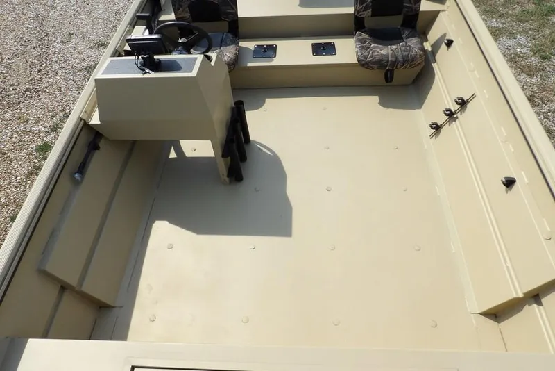 Slide: The Image of 2023 Crestliner 2070 Retriever SC boat interior with steering console and seating. - 15