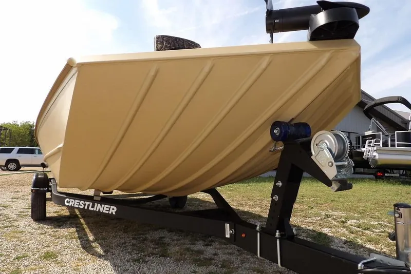 Slide: The Image of 2023 Crestliner 2070 Retriever SC boat on trailer, outdoor display. - 23