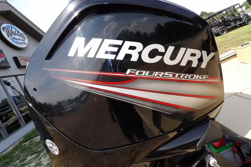 Slide: The Image of Mercury FourStroke engine on 2023 Crestliner 2070 Retriever SC at White's Marine Center. - 25