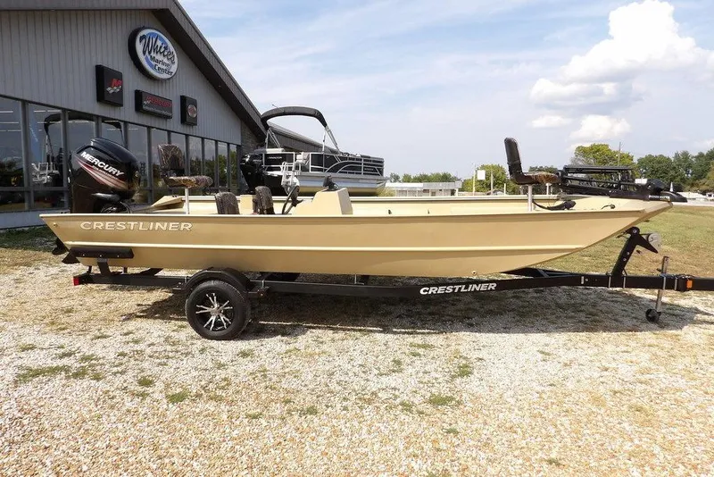 Slide: The Image of 2023 Crestliner 2070 Retriever SC boat on trailer outside dealership. - 3