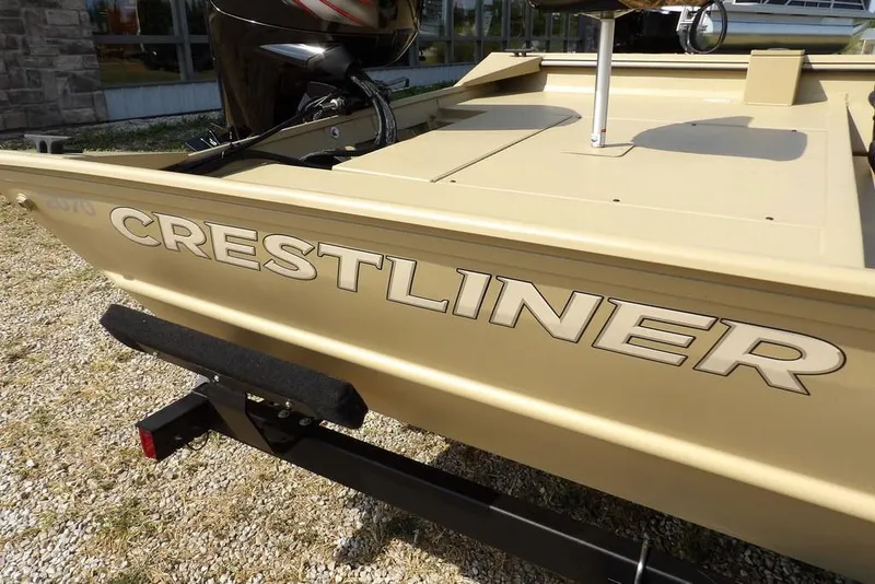 Slide: The Image of 2023 Crestliner 2070 Retriever SC boat on trailer, side view. - 33