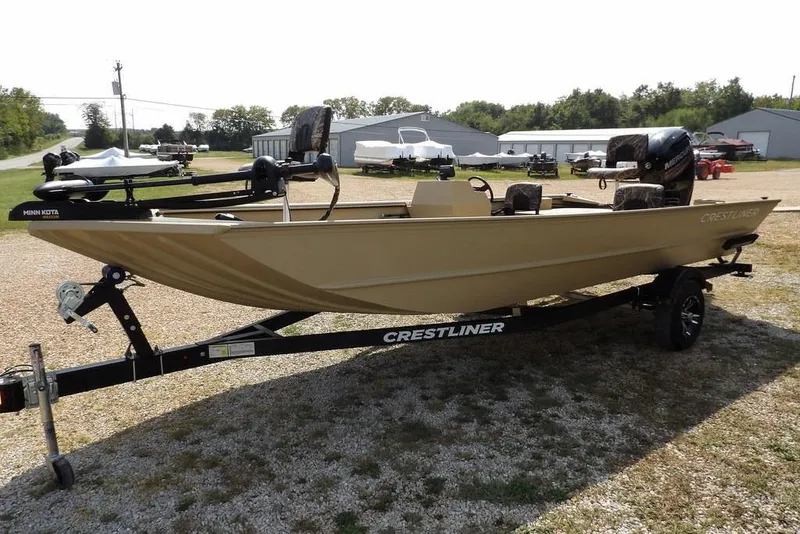 Slide: The Image of 2023 Crestliner 2070 Retriever SC boat on trailer, parked outdoors. - 5