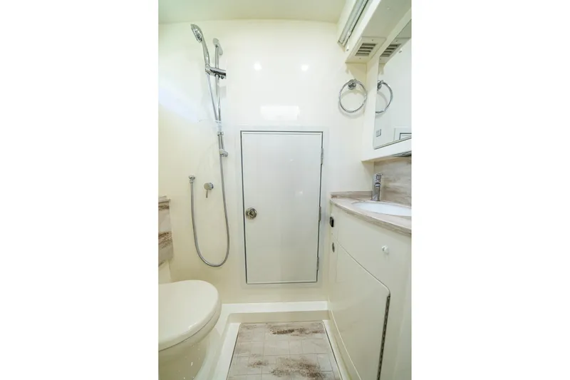 Slide: The Image of Luxurious interior of 2023 Valhalla Boatworks V-46 with elegant seating and table. - 23