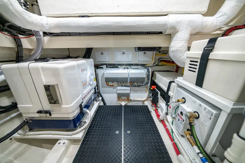 Slide: The Image of Luxurious interior of 2023 Valhalla Boatworks V-46 with modern kitchen and control panels. - 25