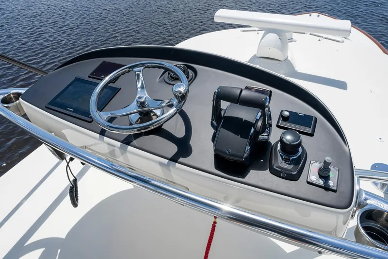 Slide: The Image of 2023 Valhalla V-46 boat bathroom with shower, toilet, and sink. - 27