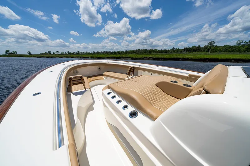 Slide: The Image of 2023 Valhalla Boatworks V-46 with quad engines on a sunny day. - 7