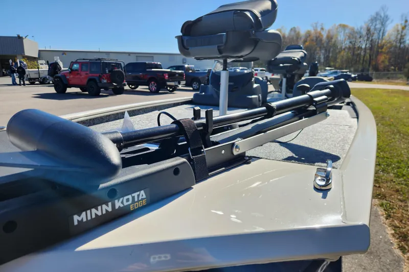 Slide: The Image of 2026 Tracker Pro 170 boat with Minn Kota Edge trolling motor in a parking lot. - 8