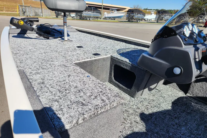 Slide: The Image of 2026 Tracker Pro 170 boat interior with steering console and seating. - 9