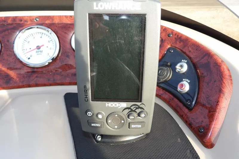 Slide: The Image of Console of 2012 Sun Tracker Party Barge 22 DLX with Lowrance fish finder. - 25