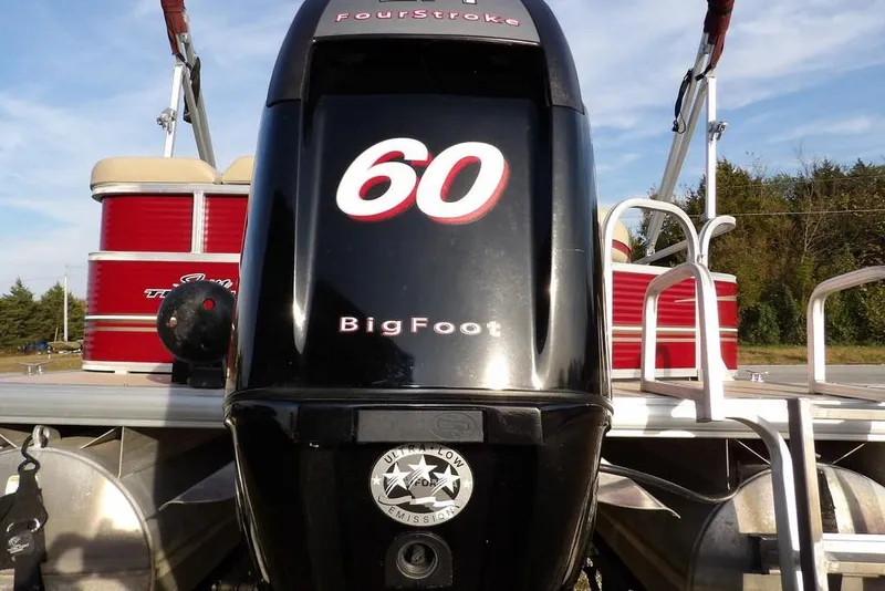 Slide: The Image of 2012 Sun Tracker Party Barge 22 DLX with 60 HP BigFoot engine, rear view. - 46