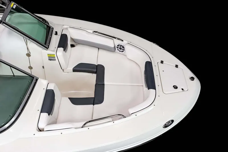 Slide: The Image of Manufacturer Provided Image: 2025 Robalo R207 Dual Console boat interior with cushioned seating and sleek design. - 8