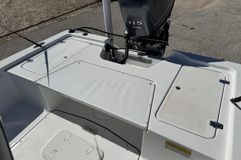 Slide: The Image of 2016 Sportsman Island Bay 20 boat with Yamaha 115 engine, rear deck view. - 13